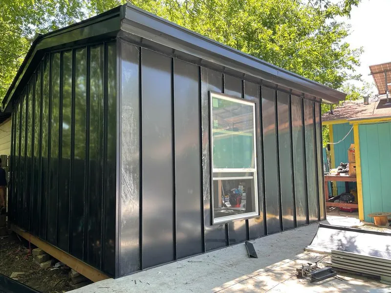 Black standing seam metal wall panels for Roof Inspection in Branchburg