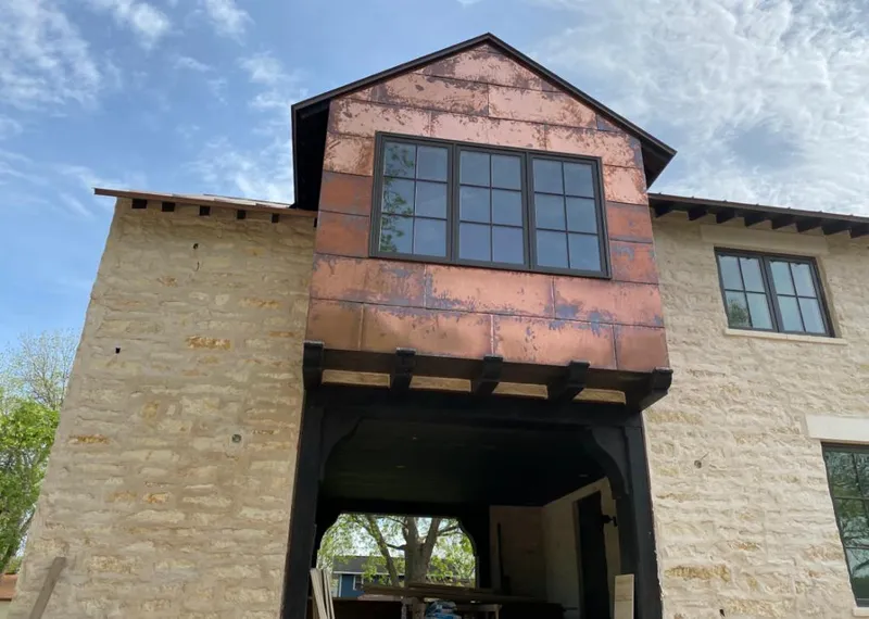 Copper metal panel facade on a stone building for Skylight Installation in Branchburg
